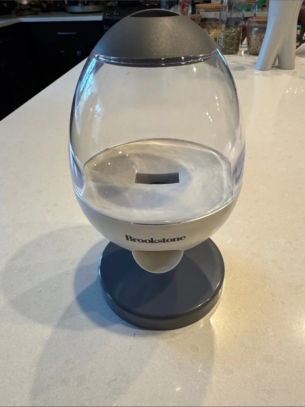 Brookstone Gray and Clear Egg-Shaped Candy treat nut Dispenser